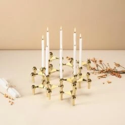 STOFF Copenhagen STOFF Nagel Candleholder, Brass -Hay Outlet Store Advent with light cropped 1