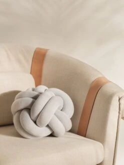 Design House Stockholm Knot Cushion, White - Grey -Hay Outlet Store image2 2351 0200 KnotCushionWhiteGrey Lifestyle